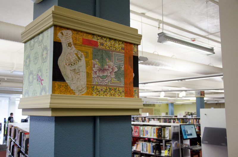 A series of framed collage installations on columns and walls at the Boise Library at Collister.