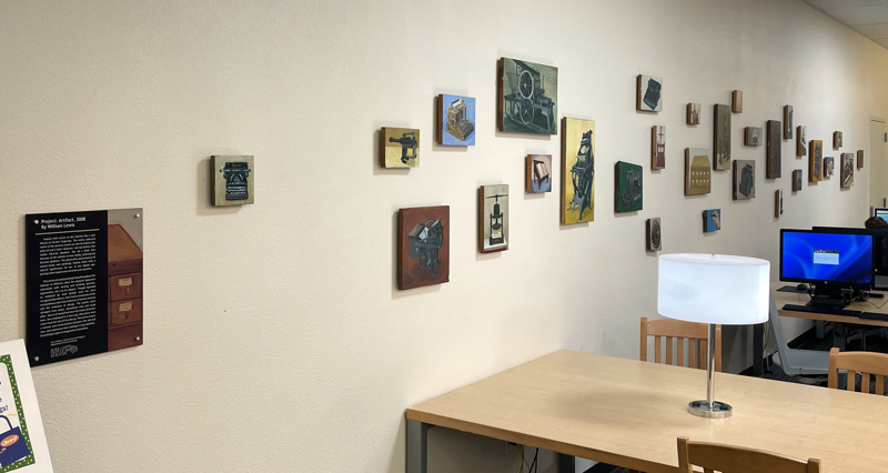 An installation of 31 paintings depicting antique printing and writing equipment.