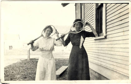 MS067 D01 024 Womenoutsidehouseatustick Early1900s A&H 1000