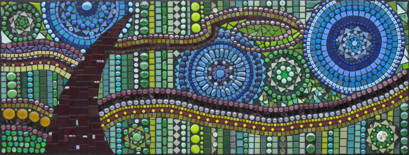 A glass tile mosaic of circles and spirals.