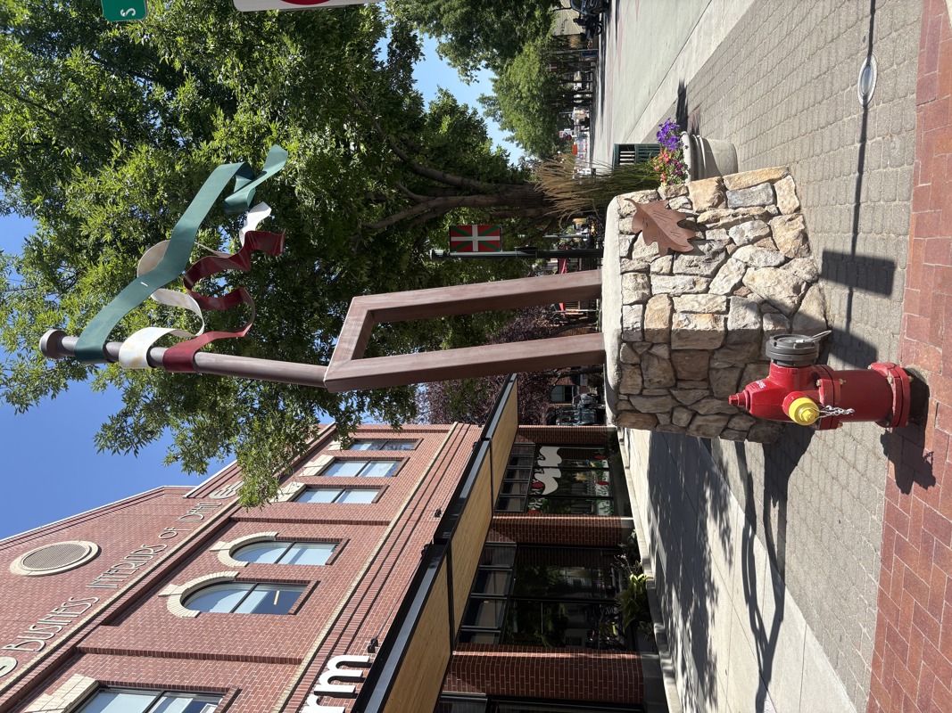 Two large sculptures of laiak (Basque farming tools) that flank the entrance to Boise's Basque Block on Grove St.