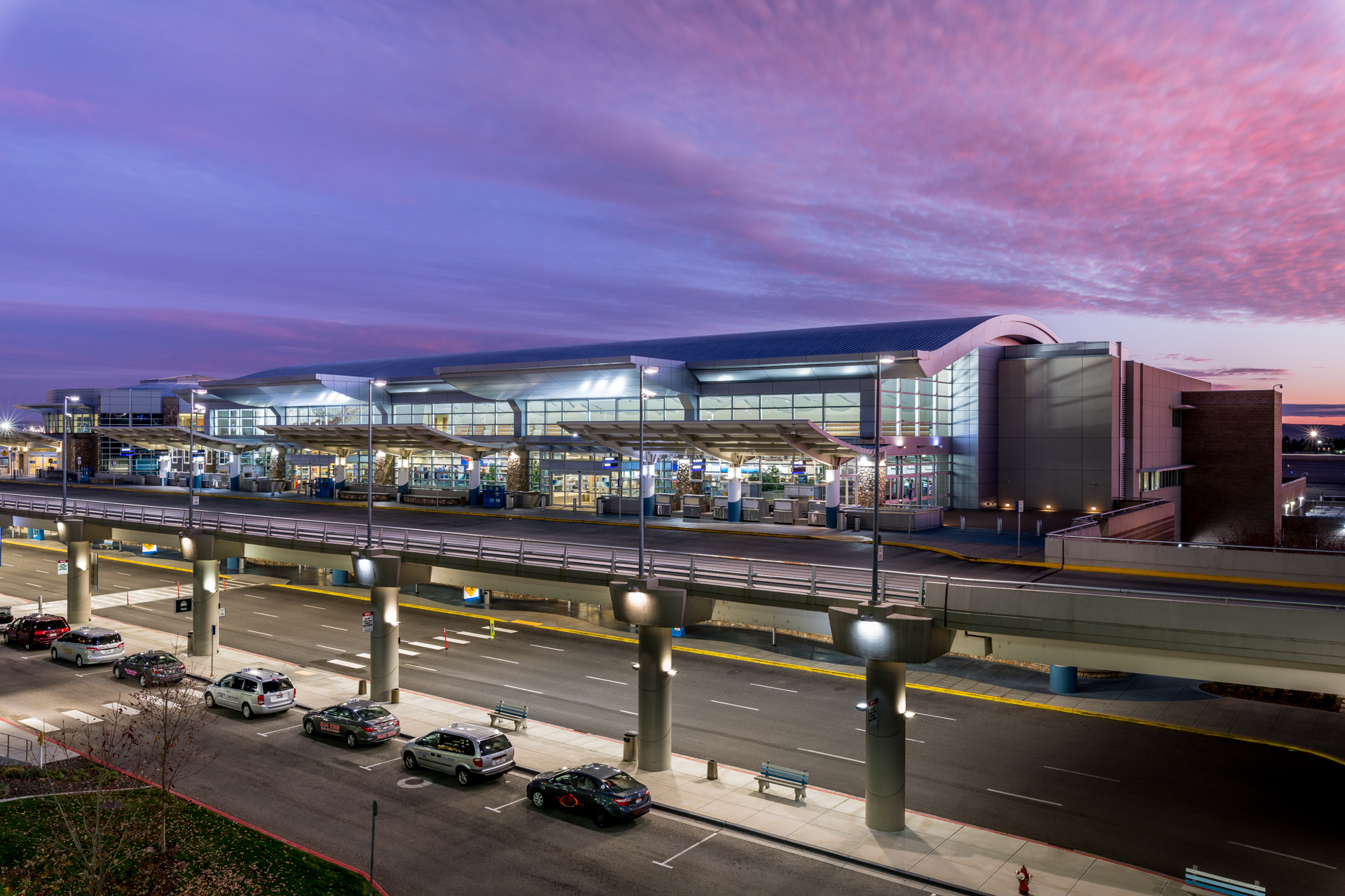 Exterior of Boise Airport showing both upper and lower level at sunset. 