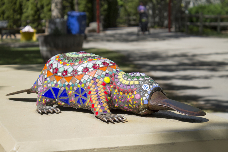 A glass mosaic sculpture of a platypus.