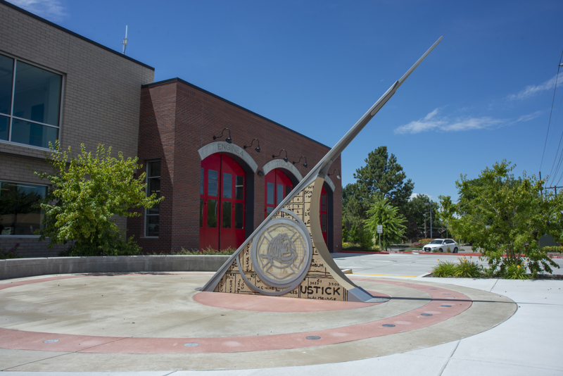 An image of a large sundial sculpture situated in front of Boise Fire Station #4.
